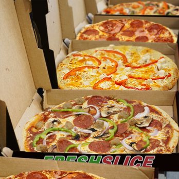 Freshslice Pizza - a row of pizzas - Pizza Near Me - Toronto, Ontario Freshslice Pizza - a row of pizzas - Pizza Near Me - Toronto, Ontario