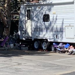 This is what you see at this park. Makes you lock everything and not sleep well at night. Would you stay here. Looks like a homeless camp.