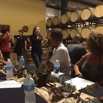Grapeline Wine Tours - Lunch at Cougar Winery in the barrel room - Wine Tours Near Me - Temecula, California