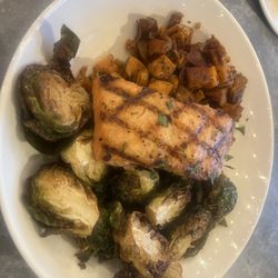 Jacksons Restaurant + Bar - Grilled Salmon comes with sweet potato hash and Brussels sprouts