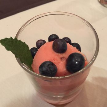 The Thistle - The Blood Orange Sorbet - with pieces of orange and topped with fresh blueberries - yum! - New American Near Me - Thompsonville, Michigan The Thistle - The Blood Orange Sorbet - with pieces of orange and topped with fresh blueberries - yum! - New American Near Me - Thompsonville, Michigan