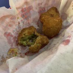 Captain Black's Bar & Grill - What was left of our broccoli app. Not healthy but really really good. Tasted like broccoli and cheese soup :)