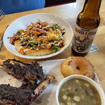 Tocabe An American Indian Eatery - Bison ribs. Green chili stew with ground bison. Fry bread with shredded bison and trimmings. - American Near Me - Denver, Colorado Tocabe An American Indian Eatery - Bison ribs. Green chili stew with ground bison. Fry bread with shredded bison and trimmings. - American Near Me - Denver, Colorado