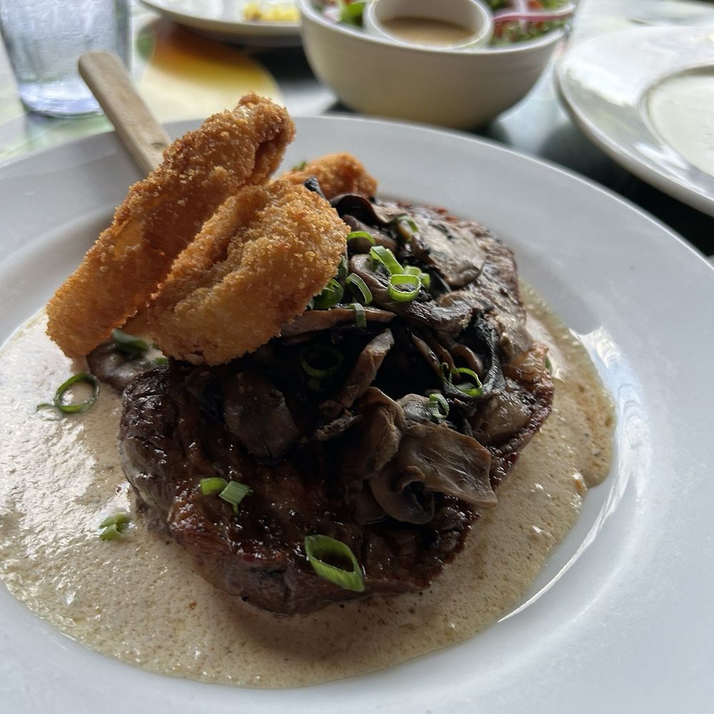 Tahiti Nui - Ribeye steak with a gorgonzola sauce topped with crunchelicious onion rings! - Seafood Near Me - Hanalei, Hawaii Tahiti Nui - Ribeye steak with a gorgonzola sauce topped with crunchelicious onion rings! - Seafood Near Me - Hanalei, Hawaii