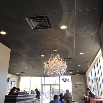 Zero Degrees - a restaurant with a chandelier hanging from the ceiling - Coffee & Tea Near Me - Roswell, New Mexico