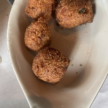 Half Shell Oyster House - Jalapeño hush puppies - Seafood Near Me - Biloxi, Mississippi Half Shell Oyster House - Jalapeño hush puppies - Seafood Near Me - Biloxi, Mississippi