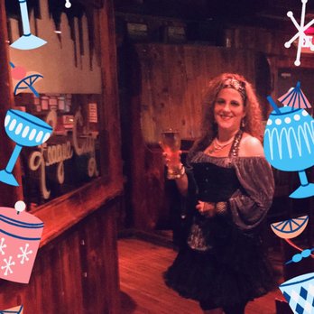 Molly's Pub - a woman standing in front of a mirror - Pubs Near Me - League City, Texas