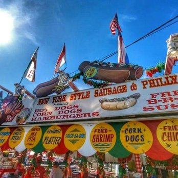 Italian Sausages - a hot dog stand at a fair - Italian Near Me Italian Sausages - a hot dog stand at a fair - Italian Near Me