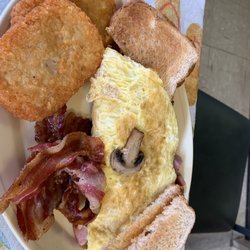 Marianne's Food Station - Western omelette, hash browns, bacon and toast.