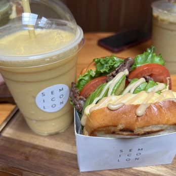Semicolon Cafe - Mango Banana Smoothie + Bulgogi Sandwich with added avocado - Desserts Near Me - New Brunswick, New Jersey Semicolon Cafe - Mango Banana Smoothie + Bulgogi Sandwich with added avocado - Desserts Near Me - New Brunswick, New Jersey