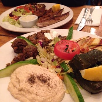 Circus - Meze platter with grilled sea bass in the background. - Breakfast & Brunch Near Me - Edinburgh, EDH Circus - Meze platter with grilled sea bass in the background. - Breakfast & Brunch Near Me - Edinburgh, EDH
