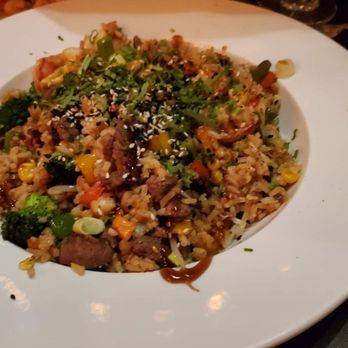 Rio's - Tasty rice dish we didnt order but was delicious so we didnt send it back - Latin American Near Me - Addison, Illinois