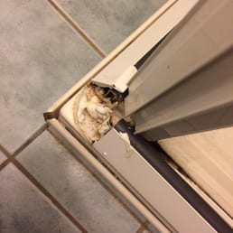 Bathroom was in disrepair. The photo shows one of the areas falling apart on the shower. Bathroom was in disrepair. The photo shows one of the areas falling apart on the shower.