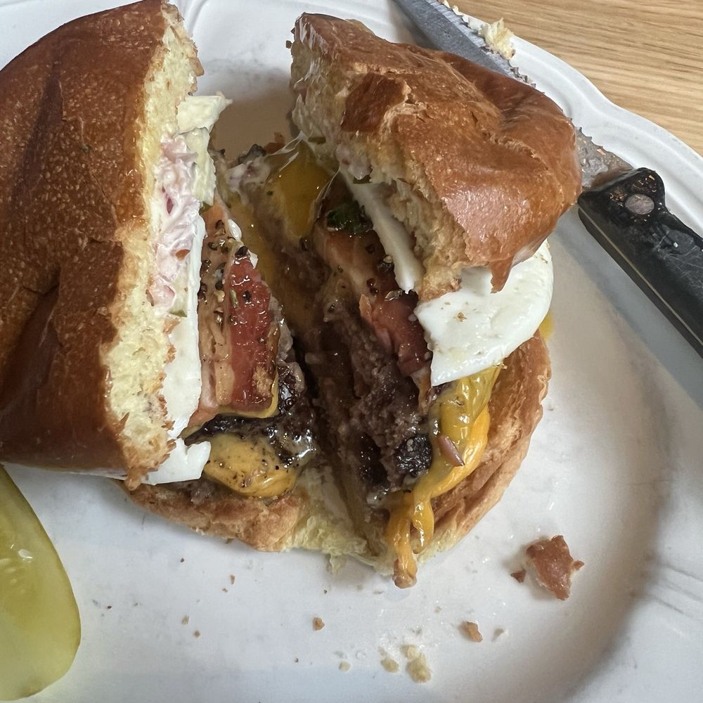 Au Cheval - Single burger with an over easy egg and peppery bacon. - Bars Near Me - Chicago, Illinois