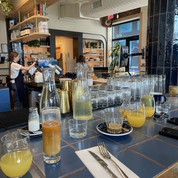 Two Hands - Mimosa carafe, iced americano, ambiance. - Breakfast & Brunch Near Me - Nashville, Tennessee Two Hands - Mimosa carafe, iced americano, ambiance. - Breakfast & Brunch Near Me - Nashville, Tennessee