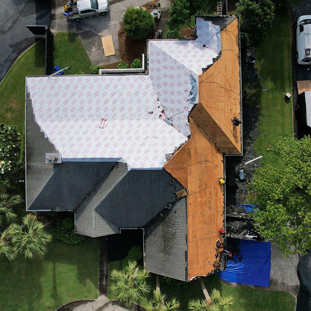 Slide of Old Town Roofing