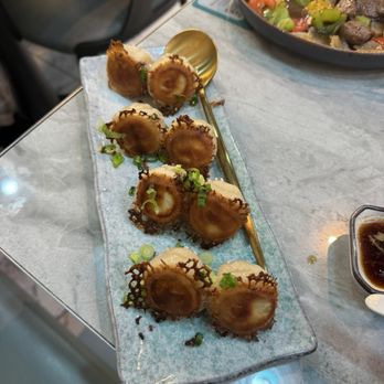 Supreme Dumplings - pan fried mini dumplings - Shanghainese Near Me - Bellevue, Washington Supreme Dumplings - pan fried mini dumplings - Shanghainese Near Me - Bellevue, Washington