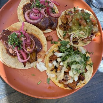 Las Guerreras - Taco Puerco Enchilado with Pineapple Taco Plantain with Mole Rojo - Vegan - Breakfast & Brunch Near Me - Oakland, California Las Guerreras - Taco Puerco Enchilado with Pineapple Taco Plantain with Mole Rojo - Vegan - Breakfast & Brunch Near Me - Oakland, California