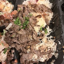 i moved the chicken and this was the serving of rice for the les amis platter for 2 kind of disappointed in cost i moved the chicken and this was the serving of rice for the les amis platter for 2 kind of disappointed in cost
