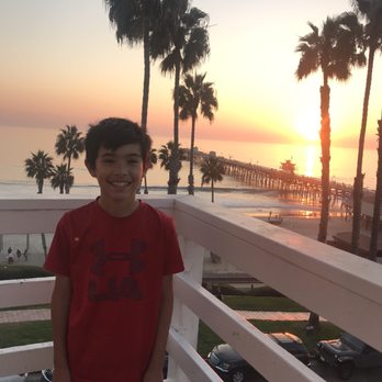 Sea Horse Resort - Enjoying the sunset from terrace overlooking the communal garden. - Hotels Near Me - San Clemente, California Sea Horse Resort - Enjoying the sunset from terrace overlooking the communal garden. - Hotels Near Me - San Clemente, California