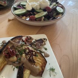 We were so excited to eat that we forgot to take pictures right away! Here is part of the eggplant starter and our salad. We were so excited to eat that we forgot to take pictures right away! Here is part of the eggplant starter and our salad.