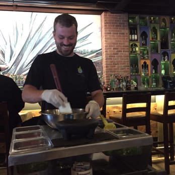 Flying Iguana - Making the guacamole at the table - Latin American Near Me - Neptune Beach, Florida Flying Iguana - Making the guacamole at the table - Latin American Near Me - Neptune Beach, Florida