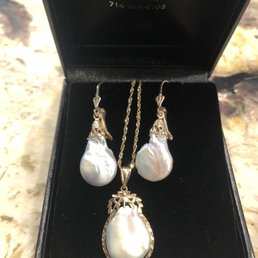 Pearl earring and they created a matching necklace for the big day! Pearl earring and they created a matching necklace for the big day!