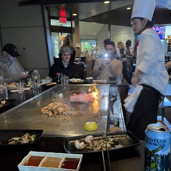 Teppan Village - a chef preparing food in a restaurant - Japanese Near Me - Whistler, British Columbia Teppan Village - a chef preparing food in a restaurant - Japanese Near Me - Whistler, British Columbia