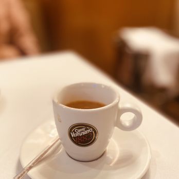 Quattro Caffe - a cup of coffee on a saucer - Italian Near Me - Costa Mesa, California Quattro Caffe - a cup of coffee on a saucer - Italian Near Me - Costa Mesa, California