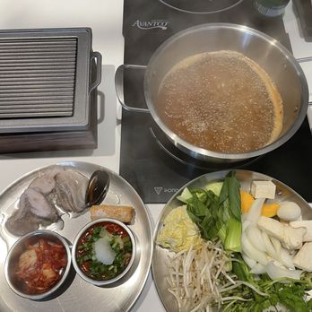 Shabuyaki - Spicy miso broth, my favorite vegetable, My DIY sauce and webfoot octopus - Hot Pot Near Me - Lake Forest, California Shabuyaki - Spicy miso broth, my favorite vegetable, My DIY sauce and webfoot octopus - Hot Pot Near Me - Lake Forest, California