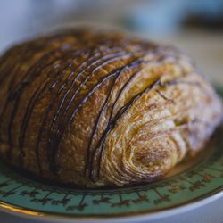 Unicorniverse Bakery & Cafe - Tasty, and large Choccie Croissant.