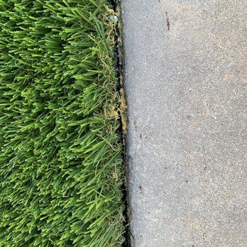 Elite Synthetic Turf - the edge of a sidewalk - Landscaping Near Me - Jupiter, Florida