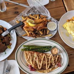 McNally's Irish Pub - Pot roast, fish and chips, Reuben boxty, and mushroom omelet with cheese and side of breakfast potatoes