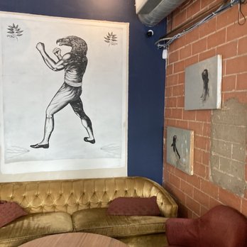 Antidote Coffee - Comfy couch and Osiris-like painting. - Coffee & Tea Near Me - Houston, Texas