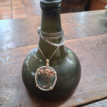 Spanish Main Antiques & Treasure - Rum Runner dual coin mount and Rum Runner Onion bottle. - Antiques Near Me - St. Augustine, Florida Spanish Main Antiques & Treasure - Rum Runner dual coin mount and Rum Runner Onion bottle. - Antiques Near Me - St. Augustine, Florida