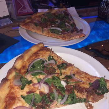 Pioneers Pizza - NY Slices..... added bacon, red onions & spinach.....very tasty. - Pizza Near Me - Punta Gorda, Florida Pioneers Pizza - NY Slices..... added bacon, red onions & spinach.....very tasty. - Pizza Near Me - Punta Gorda, Florida