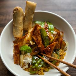 Szechwan Tofu (vegan!) extra spicy with a side of veggie egg rolls.