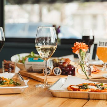 Wine House - a table of food and wine glasses - Wine Bars Near Me - Coeur d'Alene, Idaho Wine House - a table of food and wine glasses - Wine Bars Near Me - Coeur d'Alene, Idaho