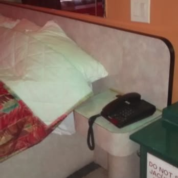 Pelham Garden Motel - View of available telephone on bedside nightstand - Hotels Near Me - Bronx, New York Pelham Garden Motel - View of available telephone on bedside nightstand - Hotels Near Me - Bronx, New York