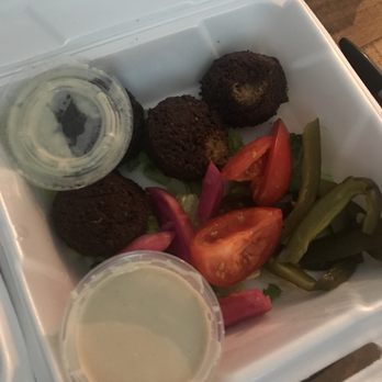 Pita Cafe - Falafel Plate, after eating 2. The order comes with six falafel. - Middle Eastern Near Me - Oak Park, Michigan Pita Cafe - Falafel Plate, after eating 2. The order comes with six falafel. - Middle Eastern Near Me - Oak Park, Michigan