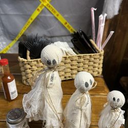 Cute Halloween Table decoration and utensils on each table.