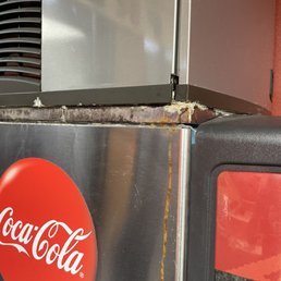 Soda machine in their wait area Soda machine in their wait area