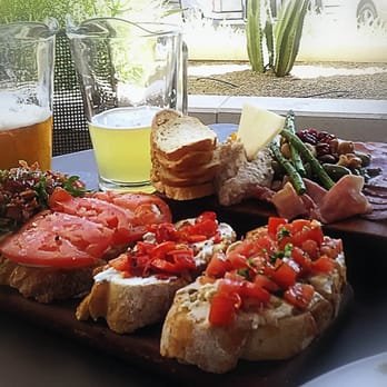Postino East - Bruschetta, Butchers Block & Pitchers of Beer on outside patio - Delightful - Wine Bars Near Me - Gilbert, Arizona