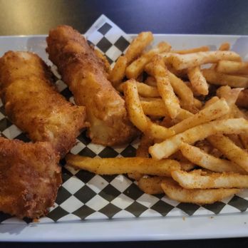 The Crooked Crow - Cod with Kansas City fries (seasoned fries with KC BBQ rub sprinkled on top) - Bars Near Me - West Allis, Wisconsin