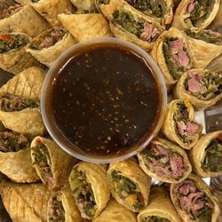 Susie’s Chicken & Fries - Susie's Soul Rolls seasoned Collards and Smoked Turkey in a Eggroll