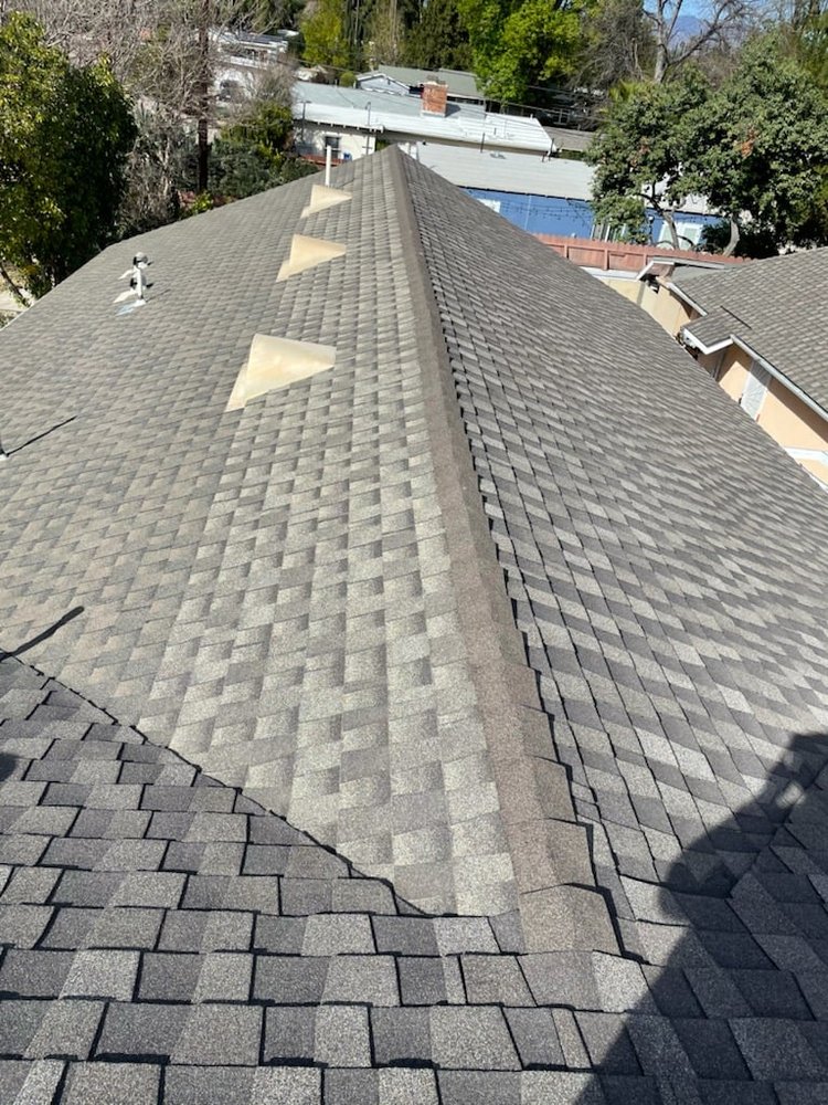 Slide of ER Roofing