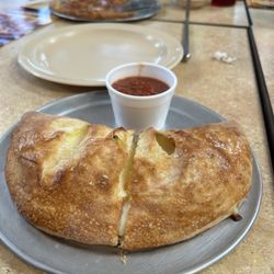 Small calzone w chicken and basil