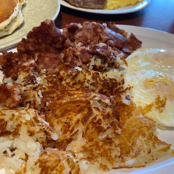 The Boardwalk Cafe - Corn Beef Hash with hash-browns and eggs. Not pictured was the toast! - American Near Me - Webster Groves, Missouri The Boardwalk Cafe - Corn Beef Hash with hash-browns and eggs. Not pictured was the toast! - American Near Me - Webster Groves, Missouri