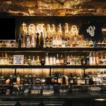 Blanco Cantina - Our tequila wall! Over 100 varieties and all 1/2 price between 3-5pm and 9pm-close everyday - Bars Near Me - Calgary, Alberta Blanco Cantina - Our tequila wall! Over 100 varieties and all 1/2 price between 3-5pm and 9pm-close everyday - Bars Near Me - Calgary, Alberta