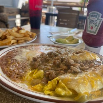 Sandy's Country Junction - Pancho Villa Breakfast Enchiladas with Chili Verde - Coffee & Tea Near Me - Clovis, California Sandy's Country Junction - Pancho Villa Breakfast Enchiladas with Chili Verde - Coffee & Tea Near Me - Clovis, California